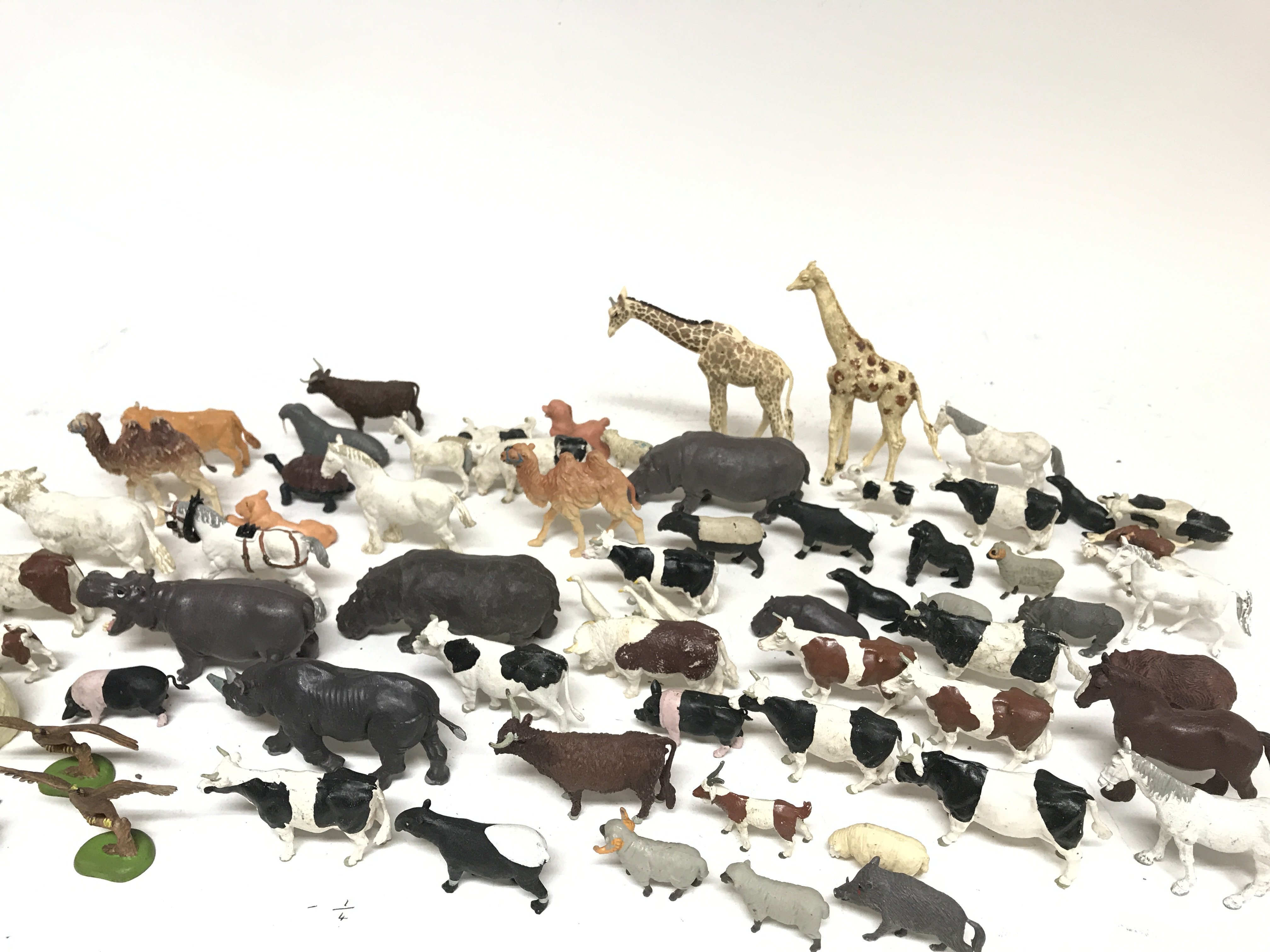 A box containing a collection of plastic animals.