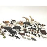 A box containing a collection of plastic animals.