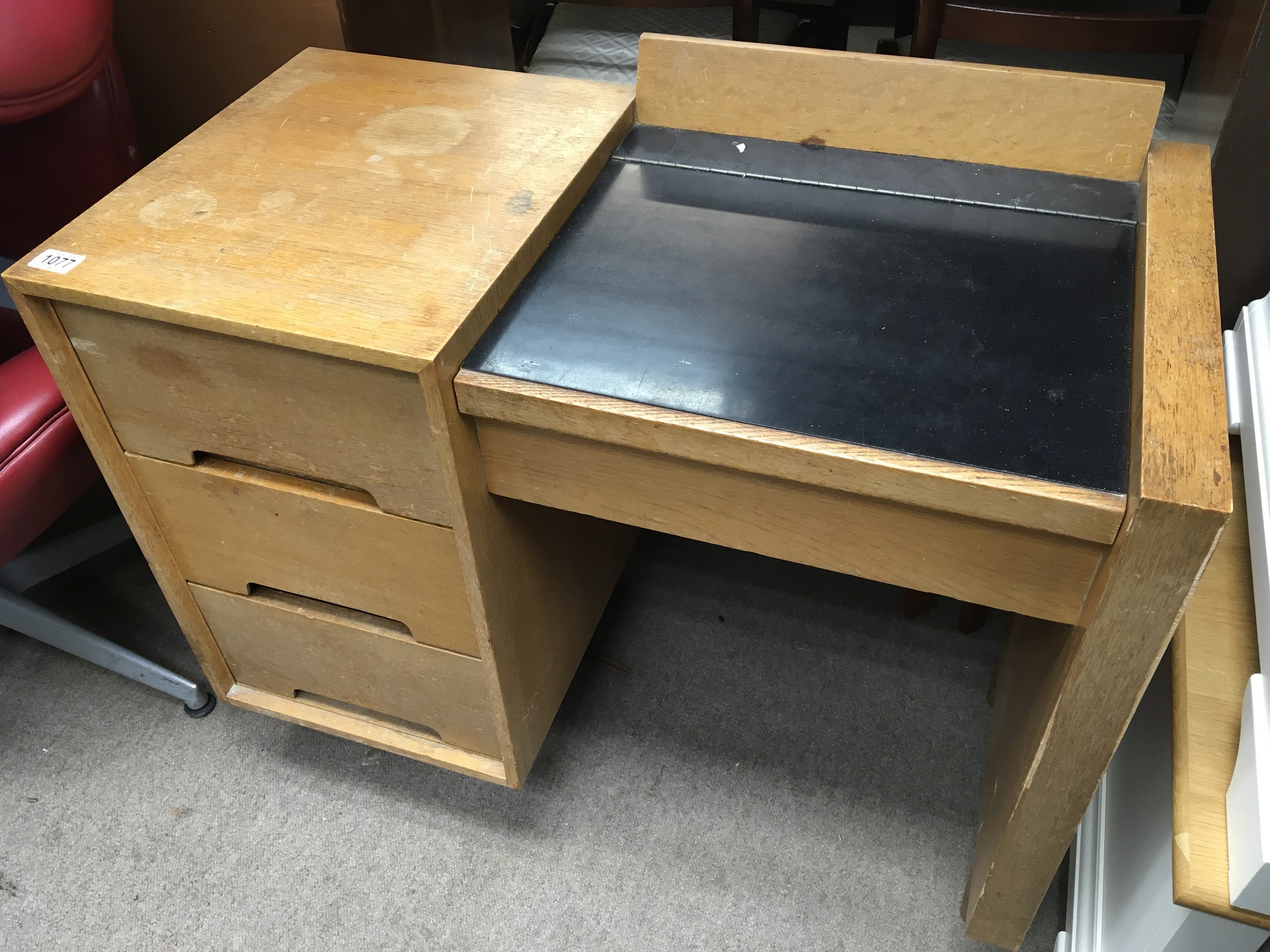 A light oak modern design Stag desk/ dressing table with a hinged top enclosing a mirror flanked