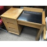 A light oak modern design Stag desk/ dressing table with a hinged top enclosing a mirror flanked