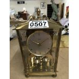A vintage brass Schatz 400 day clock