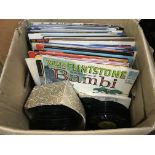 A box of LPs and 7 inch singles by various artists
