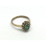 A 9ct gold emerald and diamond ring, approx 1.7g a