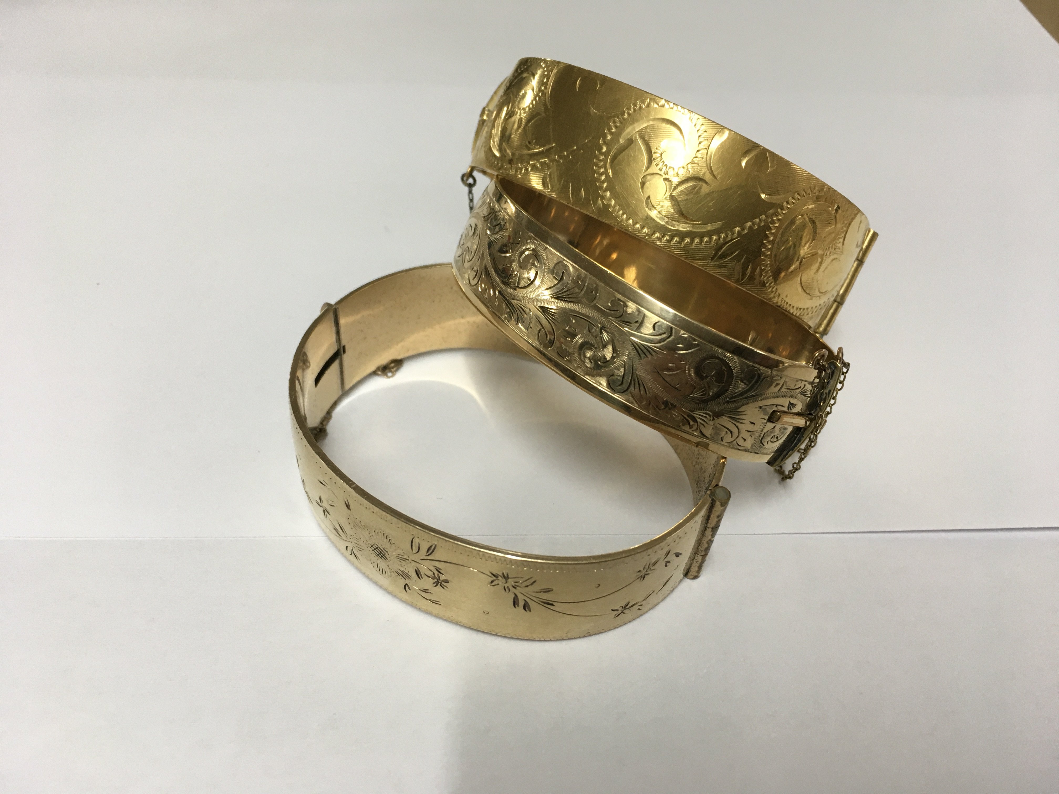 3 9ct rolled gold / metal core bangles.