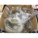 A box of various glass items including decanters,