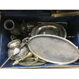 A tin trunk and metal ware contents.