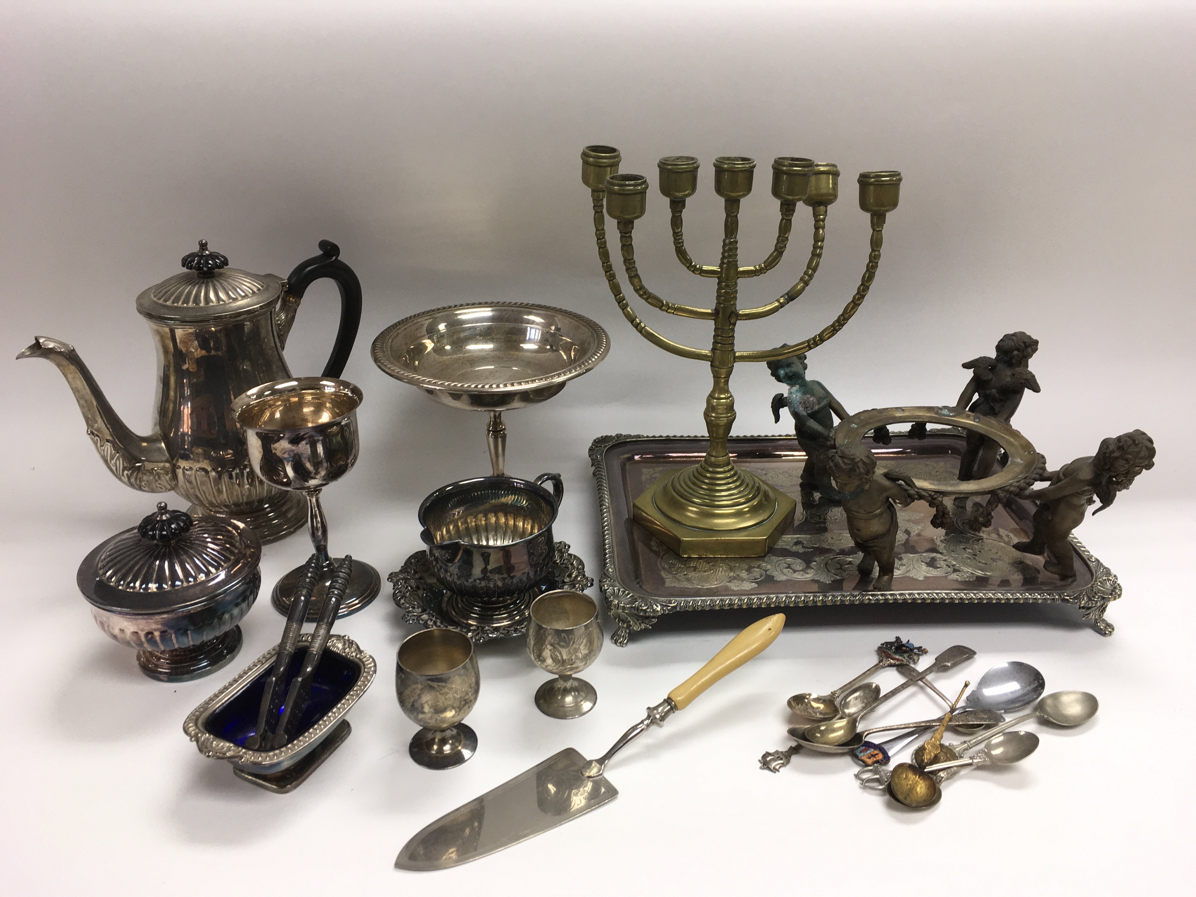 A collection of metalware including various silver