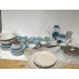 A collection of Poole pottery dinner and tea ware various colours and a part Meakin Studio ware