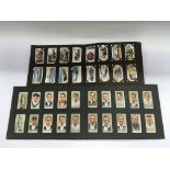 A collection of cigarette cards, trade cards etc.