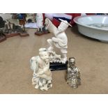 3 carved ivory figures.