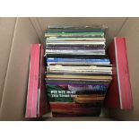 A collection of LPs by various artists including F