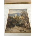 A gilt framed water colour depicting landscape with church to the background. 20 cm by 25 cm