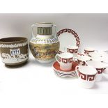 A collection of ceramics comprising a stoneware ja