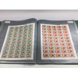 A book of 26 sheets of mint stamps from Jersey and