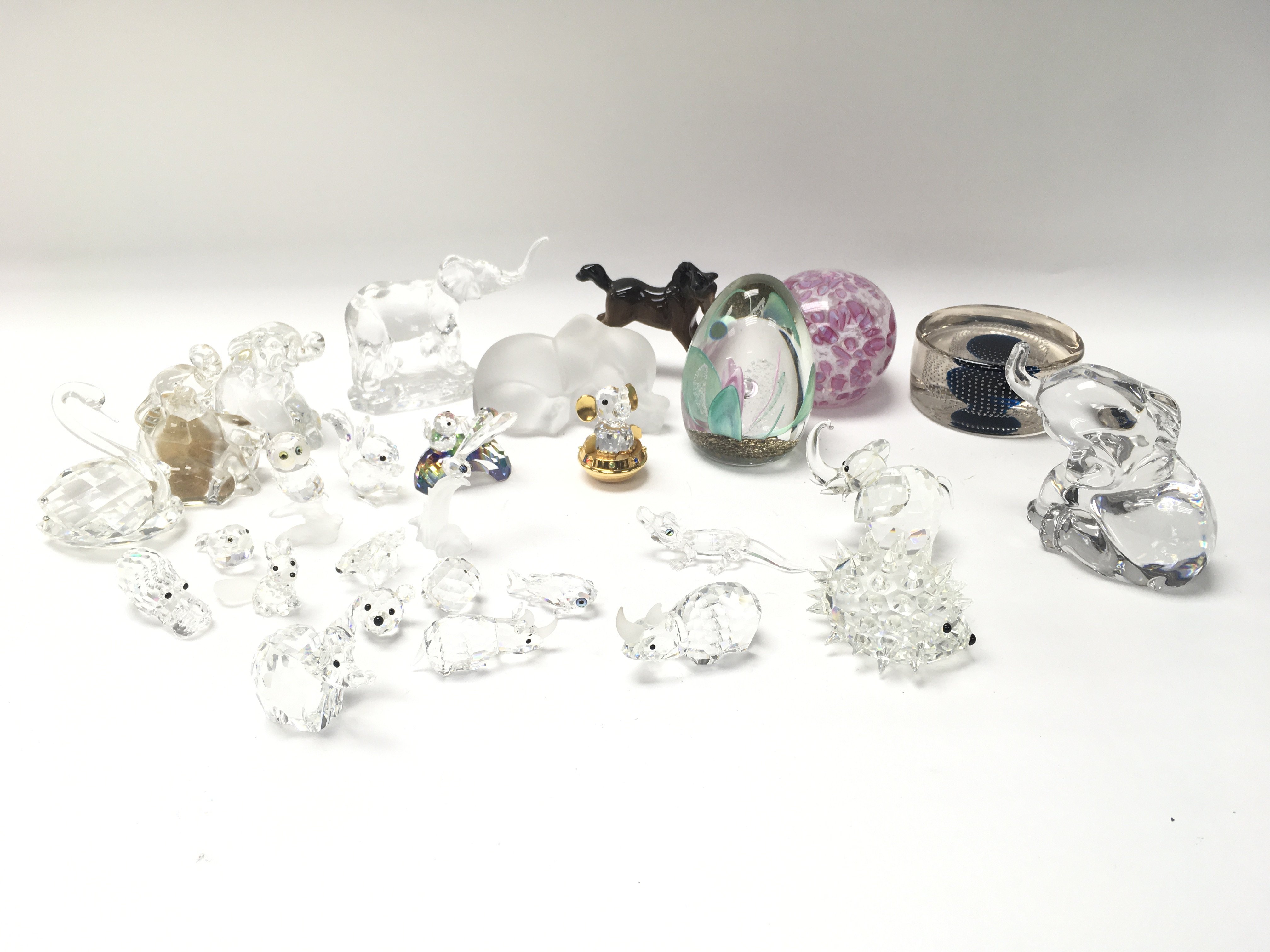 A collection of Swarovski Crystal, paper weights a