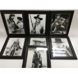 Seven framed black and white photographic prints o