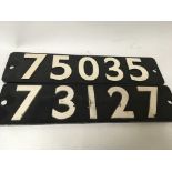 Two Cast iron train plates with raised numerals.61
