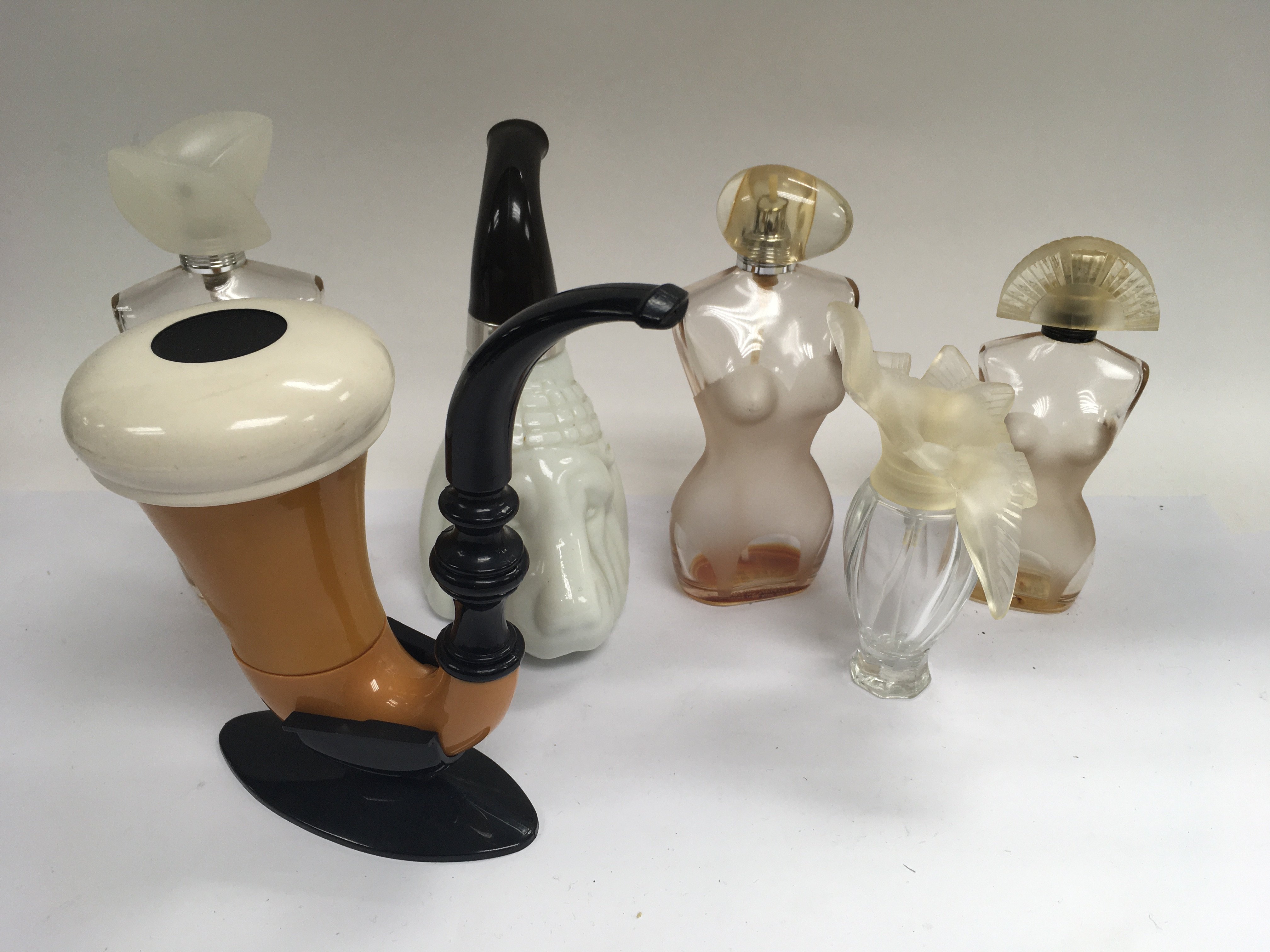 6 vintage perfume bottles inc Avon etc.