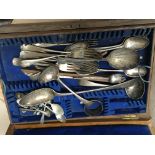 A cutlery box containing mixed silver plated cutlery.