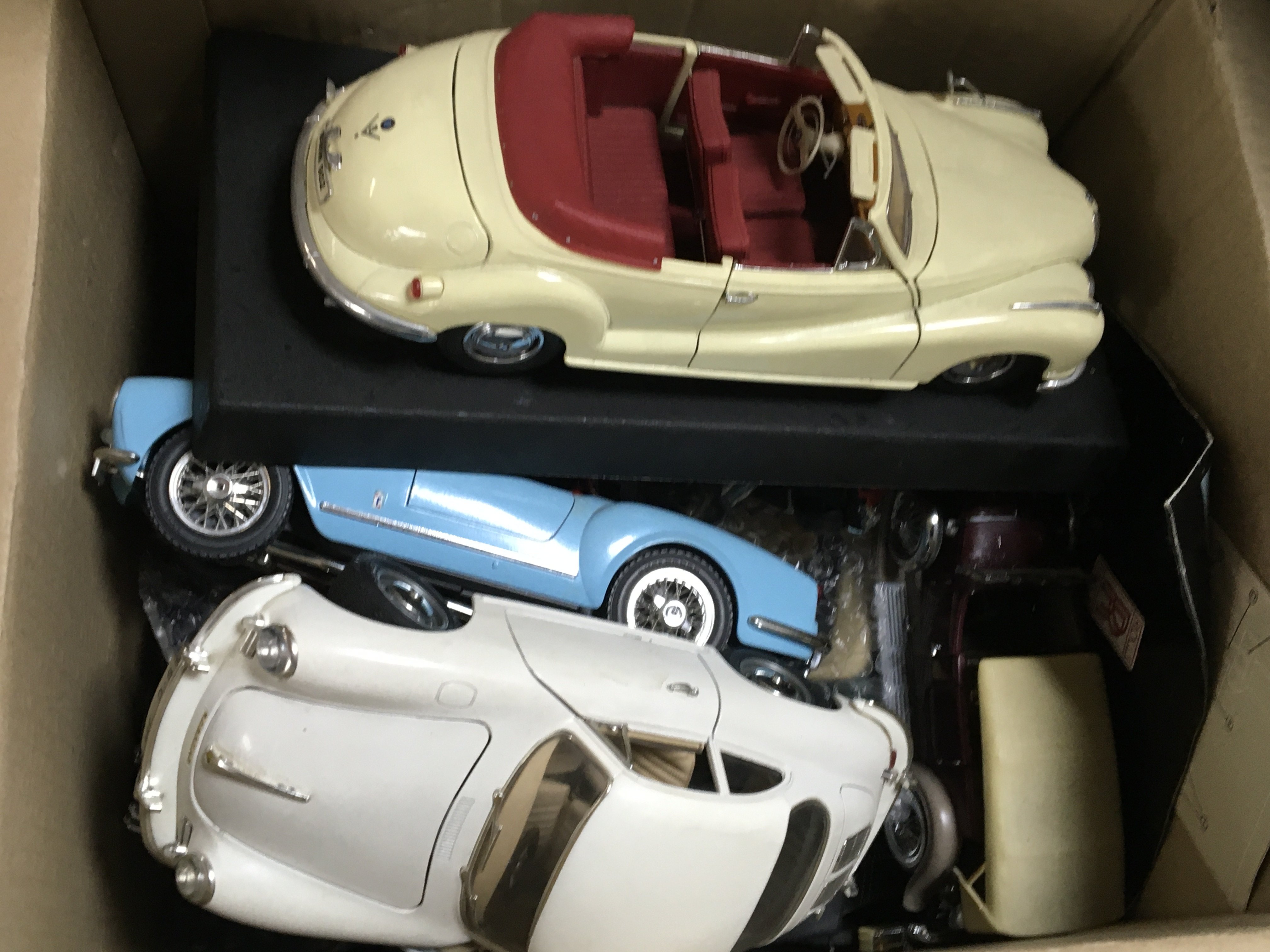 A box containing scale model cars.
