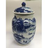 A Chinese blue and white jar and cover depicting figures on foot and in boats in a landscape