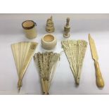 A small collection of ivory and bone items. NO RES