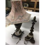 2 decorative table lamps, one with cherubs.