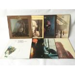 A collection of LPs including Joni Mitchell, Janis