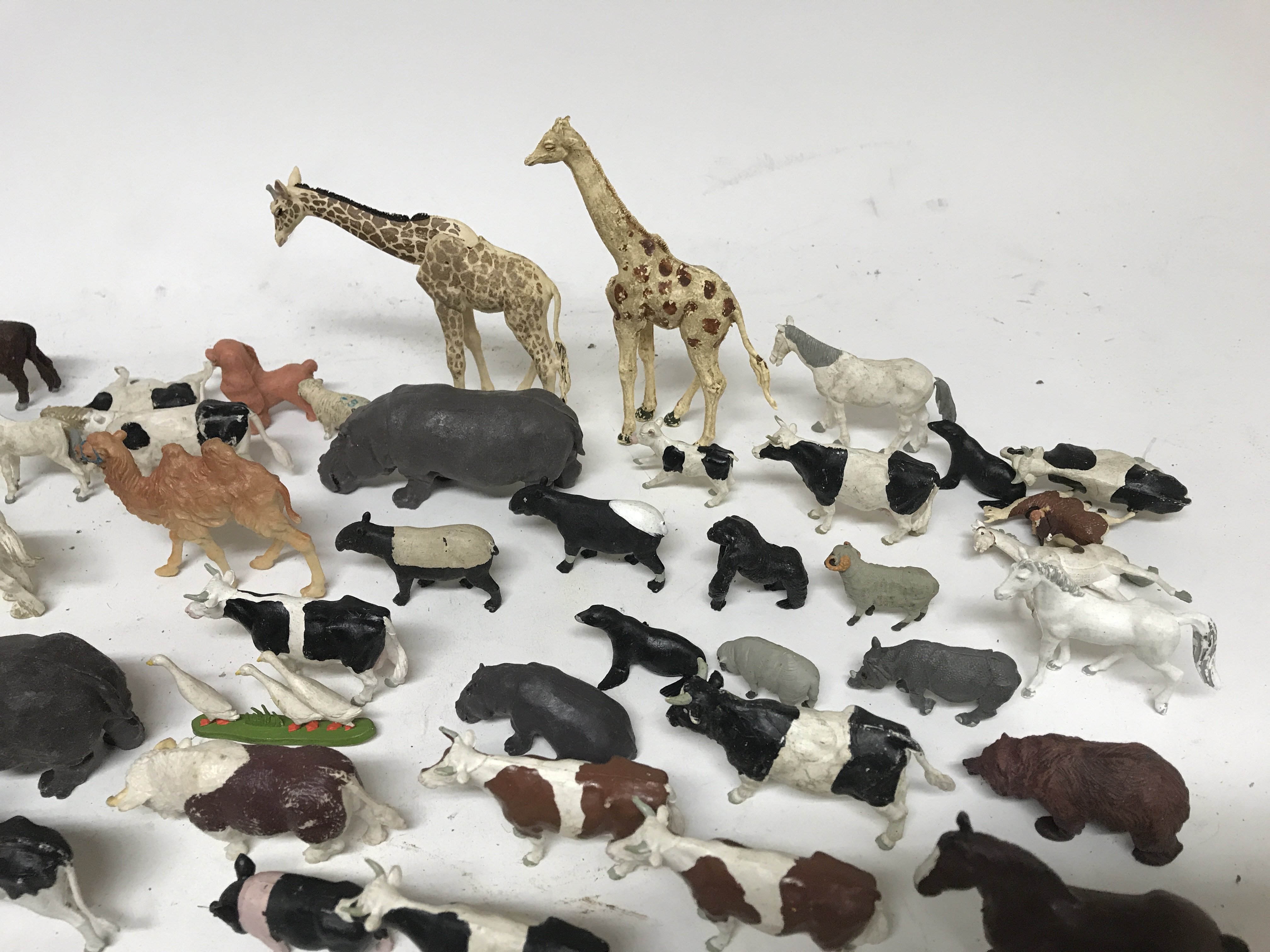 A box containing a collection of plastic animals. - Image 2 of 3