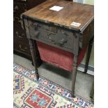 An Early Victorian Mahogany work box table the top