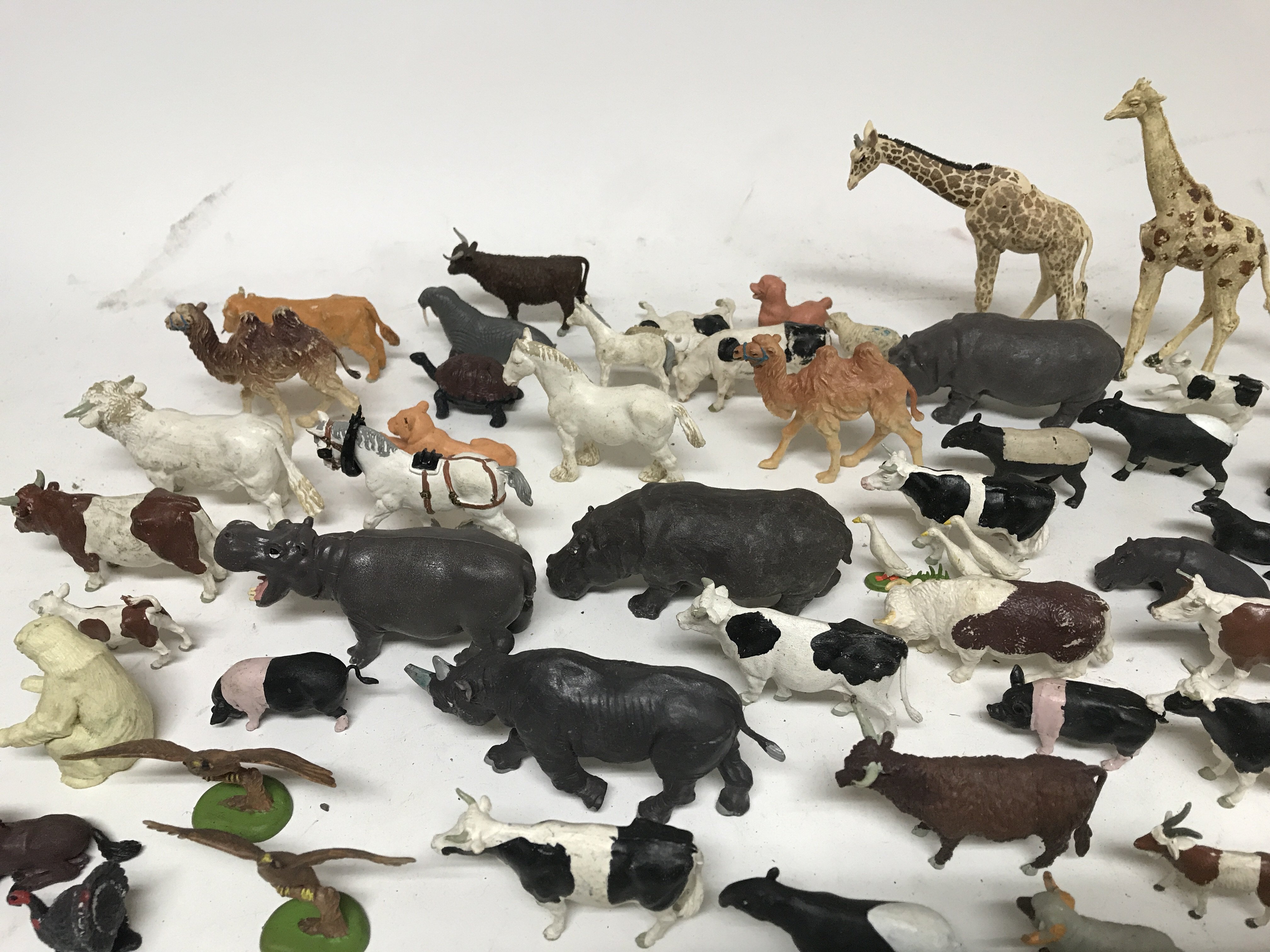 A box containing a collection of plastic animals. - Image 3 of 3