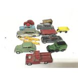 A collection of playworn Corgi, Dinky cars and tra