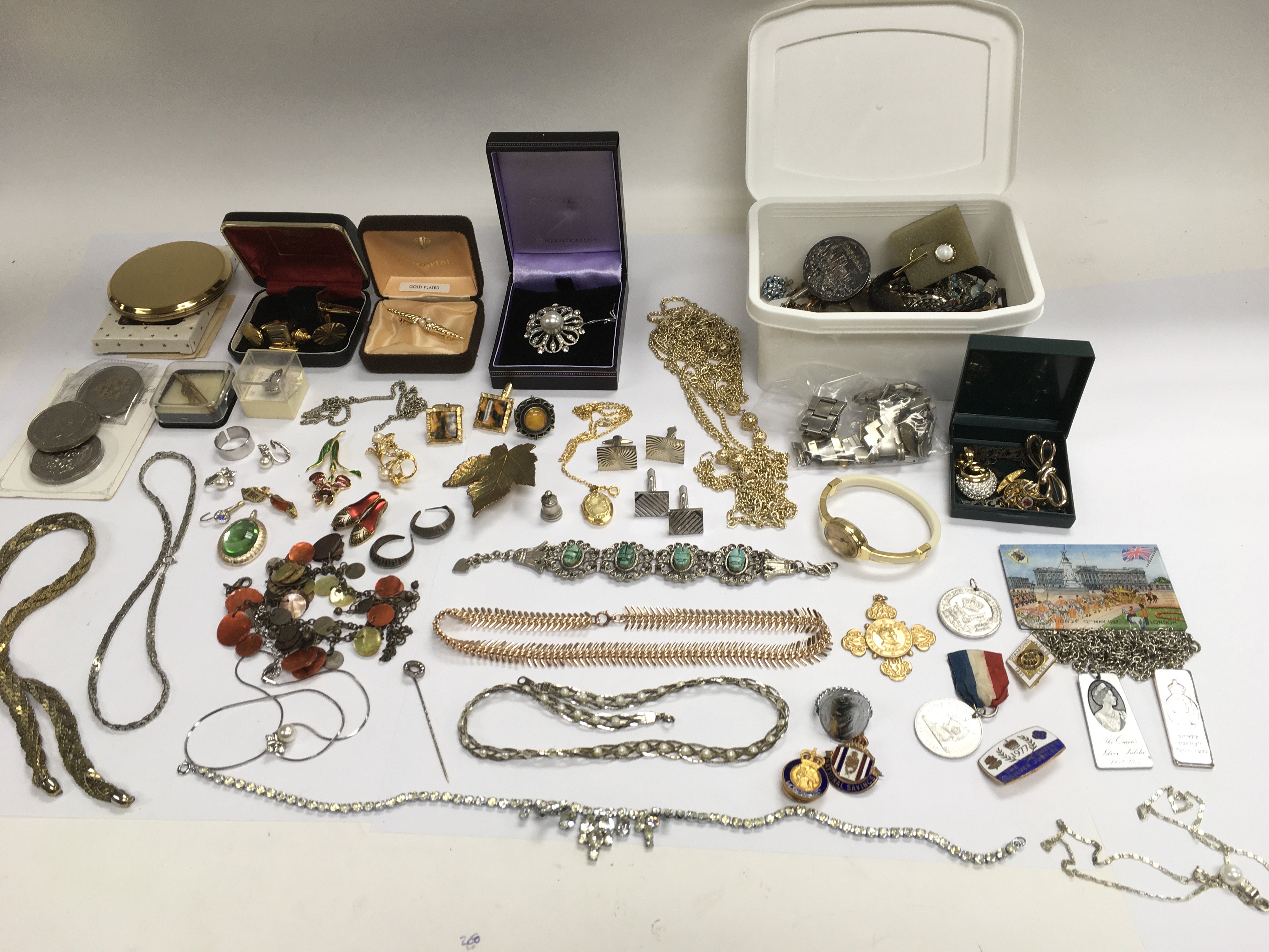 A collection of costume jewellery and coins. NO RE