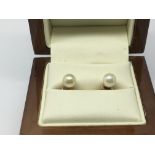 A pair of 9ct gold cultured pearl earrings.