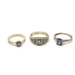 Three rings comprising two 9ct examples and one ot