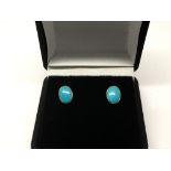 A pair of 9ct gold turquoise earrings