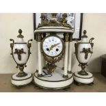 A French alabaster clock garniture of classical wi