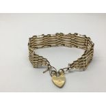 A 9ct gold gate bracelet with padlock clasp, appro