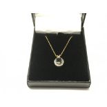 A 9ct gold sapphire and diamond pendant on a 9ct g