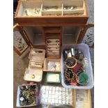 A multi drawer jewellery cabinet and contents plus