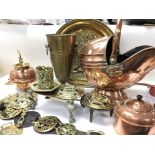 A collection of brass and copper ware including a