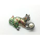 A silver plique a jour cat and ball brooch/pendant