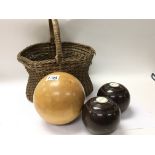 An unusual large treen ball two vintage bowling ba