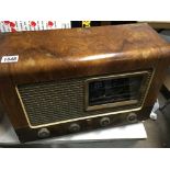 A walnut cased Ekco radio.