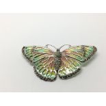 A large silver plique a jour moth brooch/pendant s