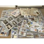 A large collection of cigarette cards.