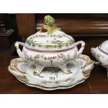 A pair of large serves style porcelain tureens and