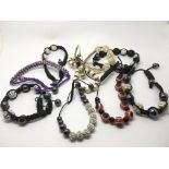 A collection of expanding bracelets including diam