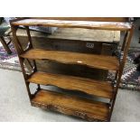 A quality Mahogany hanging cabinet with shaped she