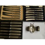 Three cased sets of silver handled knives together